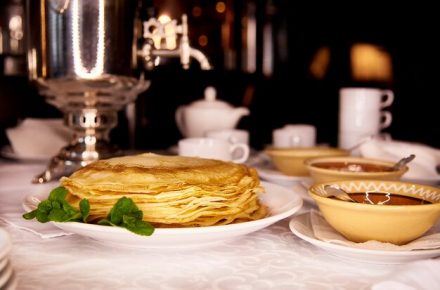 plate-with-pancakes-jam-table_83055-355